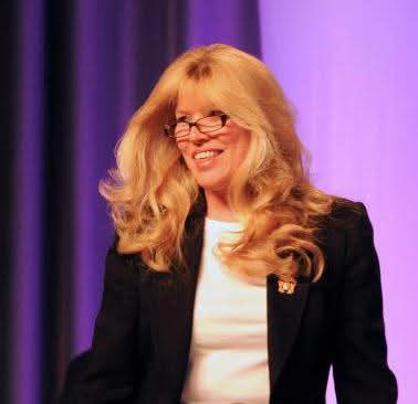Barbara Montgomery smiling on stage